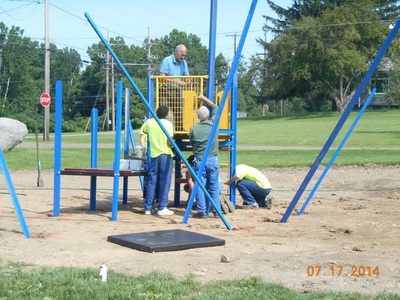 people building a playground